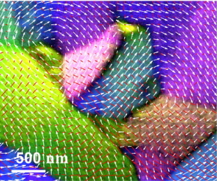 Large-angle Lorentz 4D-STEM map of the strain and magnetic field distribution in a deformed glass